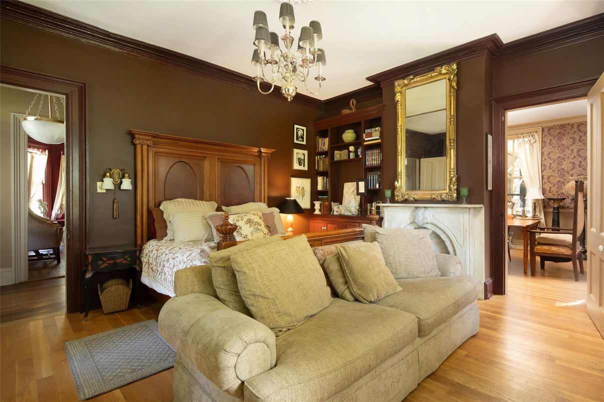Bedroom, Chandelier, Fireplace, Interior, Wood Texture Flooring