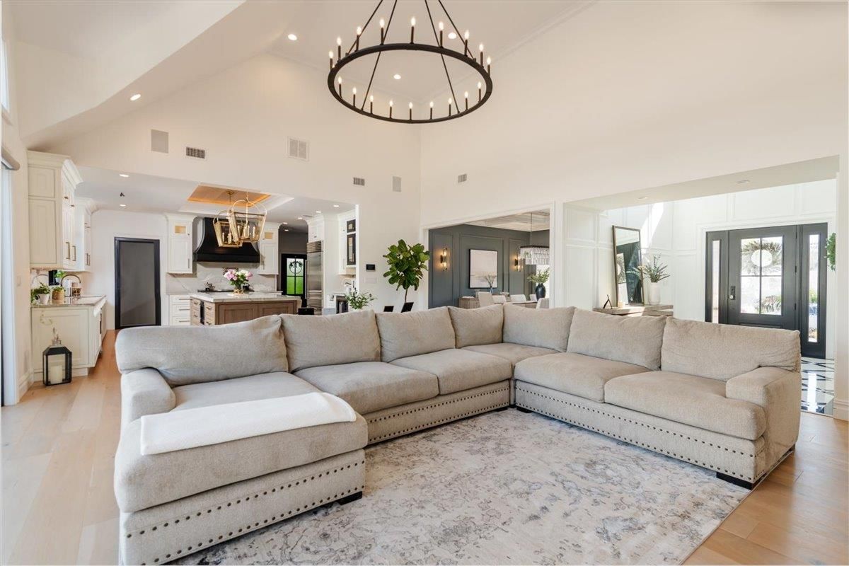 Chandelier, Dining room, Interior, Kitchen, Living room, Pendant Lights, Recessed Lighting, Wood Texture Flooring