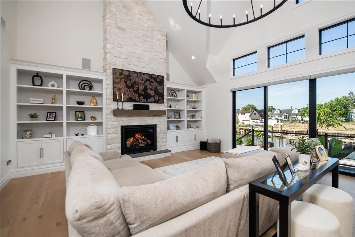 Fireplace, Interior, Living room, Recessed Lighting, Stone Walls, Wood Texture Flooring