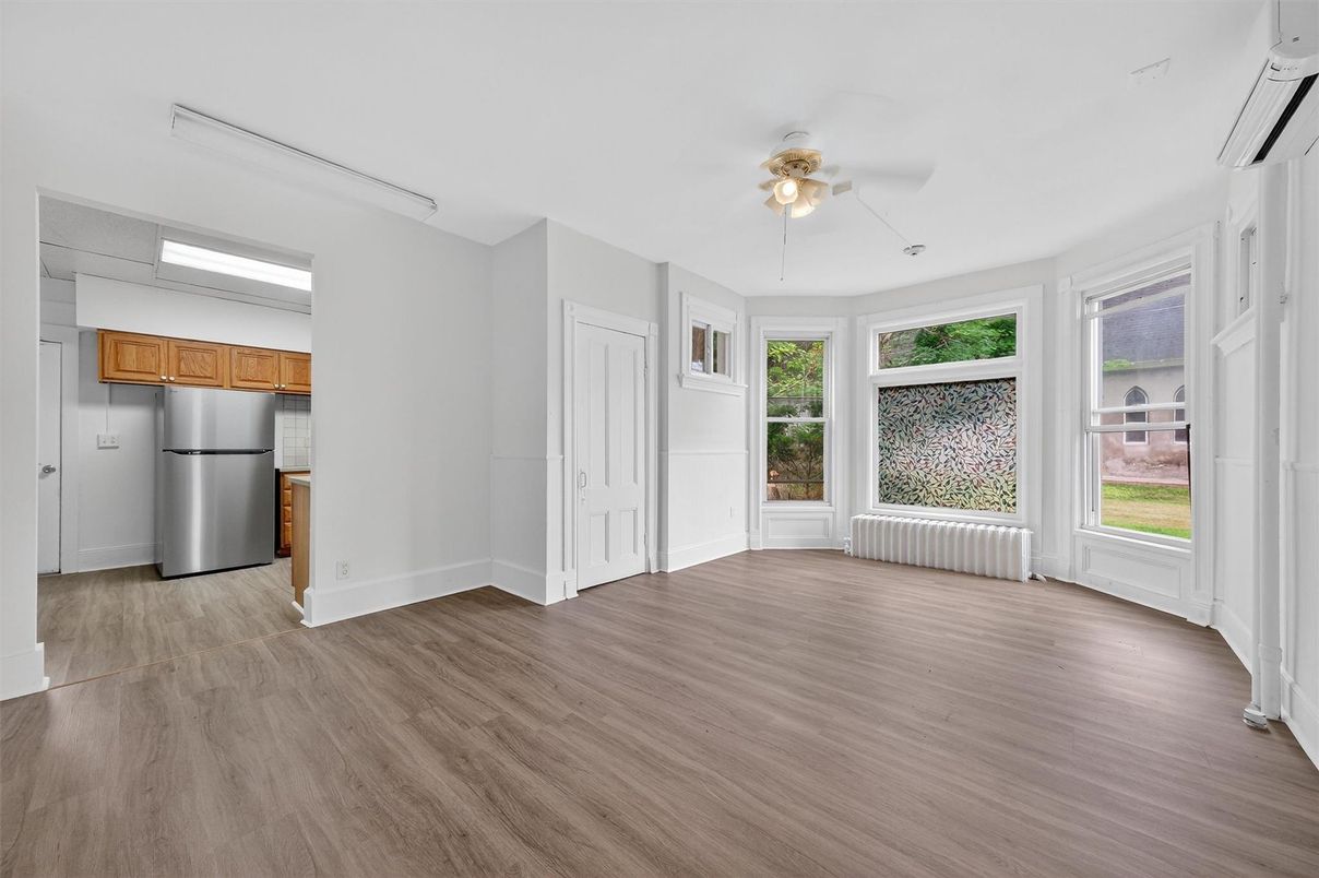 Empty room, Interior, Kitchen, Stainless Steel Appliances, Wood Texture Flooring