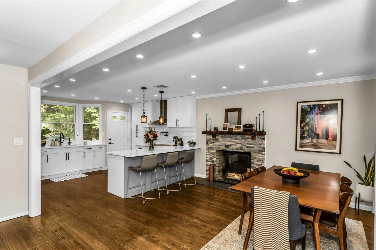 Dining room, Fireplace, Interior, Kitchen, Pendant Lights, Recessed Lighting, Wood Texture Flooring