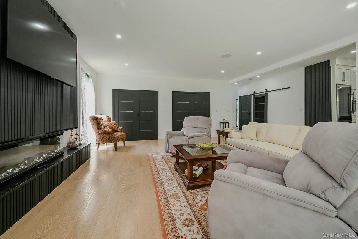 Fireplace, Interior, Living room, Recessed Lighting, Wood Texture Flooring