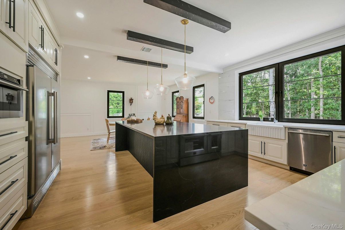 Dining room, Interior, Kitchen, Pendant Lights, Recessed Lighting, Stainless Steel Appliances, Wood Texture Flooring