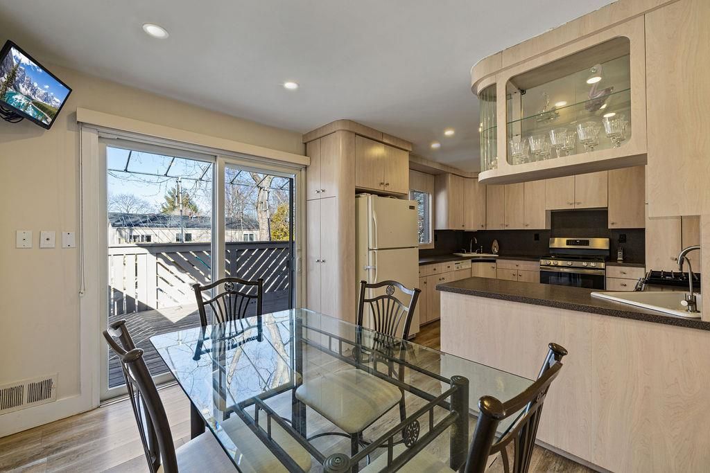 Dining room, Interior, Kitchen, Recessed Lighting, Stainless Steel Appliances, Wood Texture Flooring
