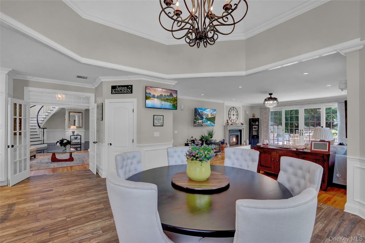 Chandelier, Dining room, Fireplace, Interior, Living room, Recessed Lighting, Wood Texture Flooring