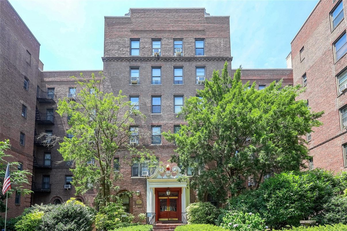 Exterior, Facade, Brick Facade, Condo Building