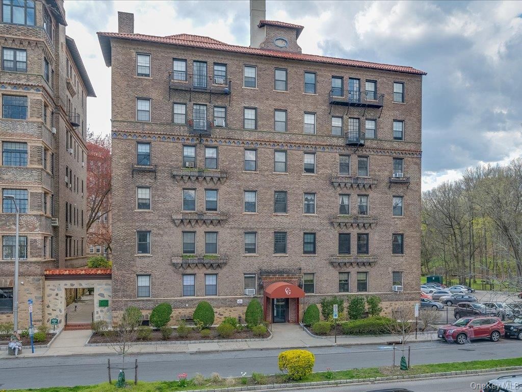Exterior, Facade, Brick Facade, Condo Building