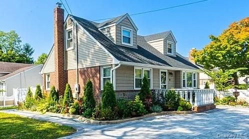 Exterior, Facade, Brick Facade, Cape Cod