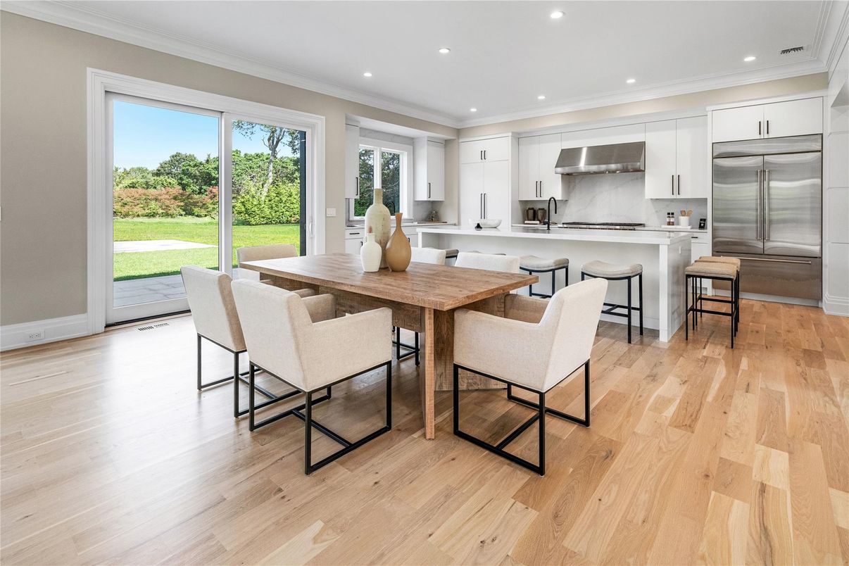 Dining room, Interior, Kitchen, Recessed Lighting, Stainless Steel Appliances, Wood Texture Flooring