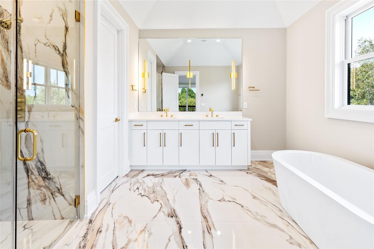 Bathroom, Dual Sink Vanities, Free Standing Baths, Glass Shower, Interior, Marble, Marble Walls, Recessed Lighting