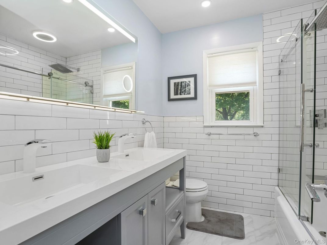 Bathroom, Dual Sink Vanities, Glass Shower, Interior, Marble, Recessed Lighting