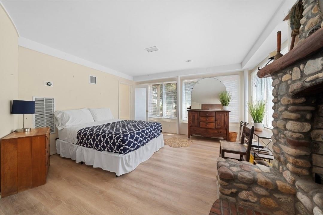 Bedroom, Fireplace, Interior, Recessed Lighting, Wood Texture Flooring