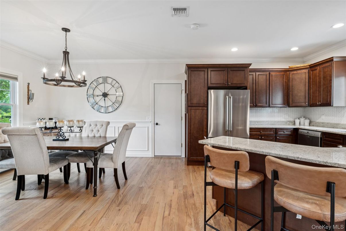 Chandelier, Dining room, Interior, Kitchen, Recessed Lighting, Stainless Steel Appliances, Wood Texture Flooring
