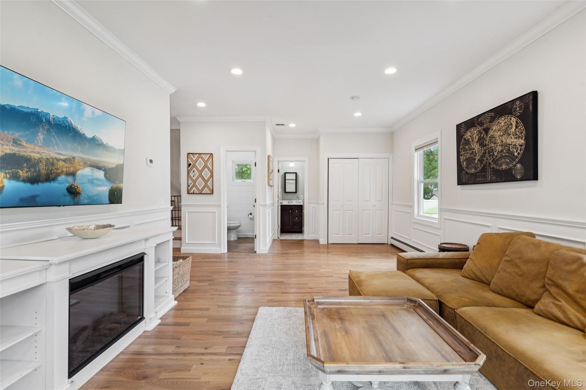 Fireplace, Interior, Living room, Recessed Lighting, Wood Texture Flooring