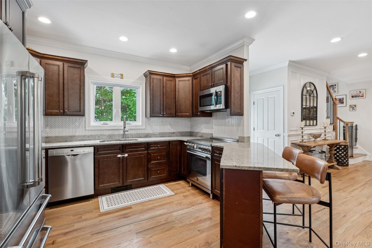 Dining room, Interior, Kitchen, Recessed Lighting, Stainless Steel Appliances, Wood Texture Flooring