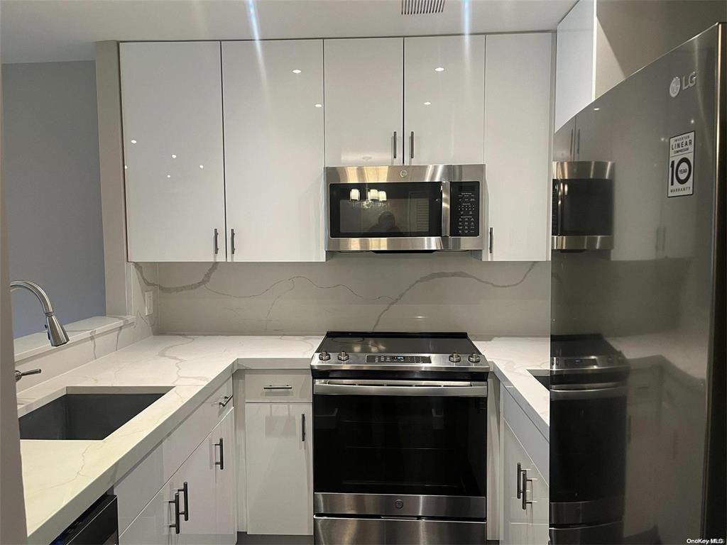 Interior, Kitchen, Marble Walls, Stainless Steel Appliances