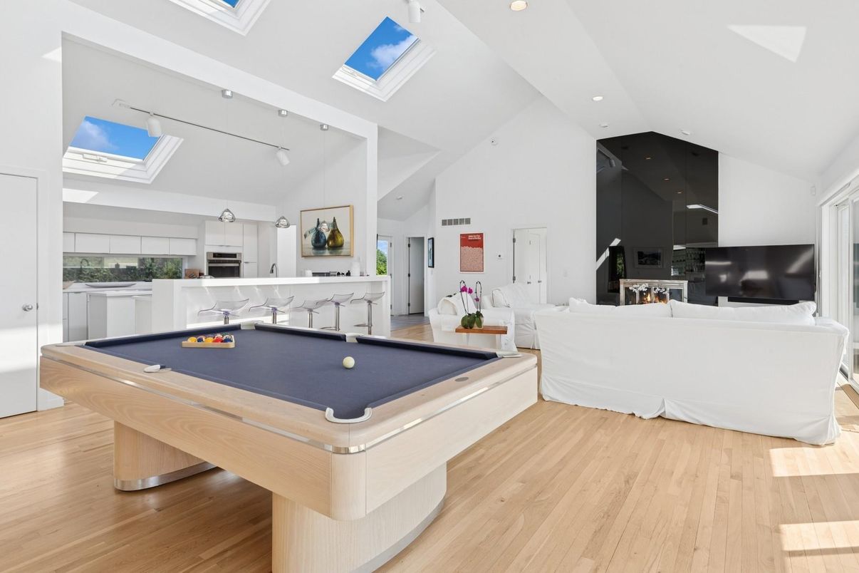 Billiard Table, Fireplace, Game Room, Interior, Living room, Recessed Lighting, Wood Texture Flooring