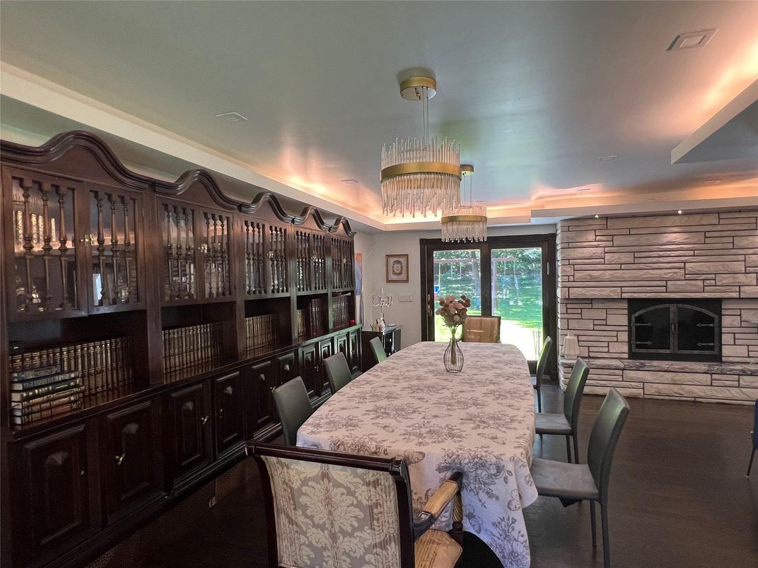 Chandelier, Dining room, Fireplace, Interior, Stone Walls