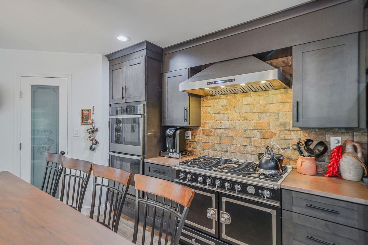 Interior, Kitchen, Recessed Lighting, Stainless Steel Appliances, Stone Walls