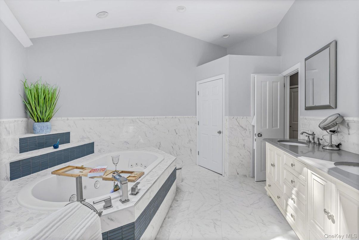 Bathroom, Dual Sink Vanities, Interior, Marble, Marble Walls, Recessed Lighting
