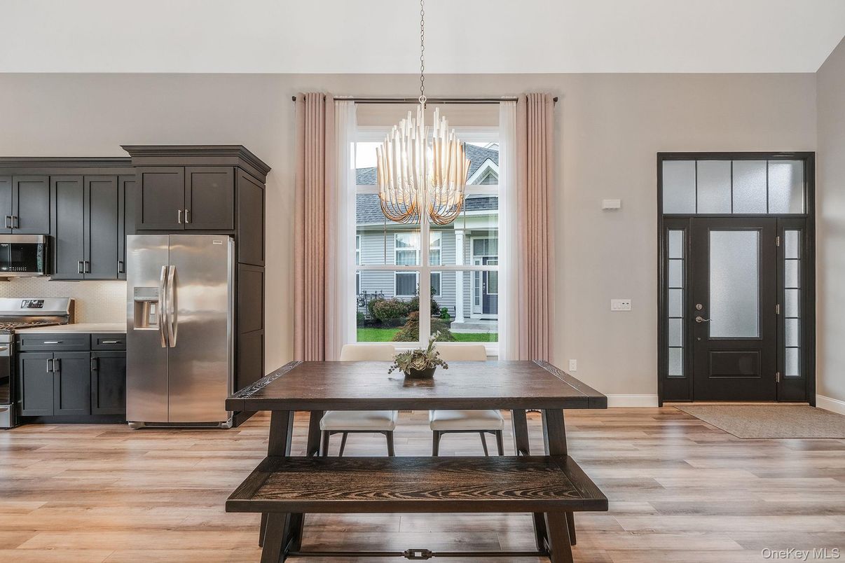 Chandelier, Dining room, Interior, Kitchen, Stainless Steel Appliances, Wood Texture Flooring