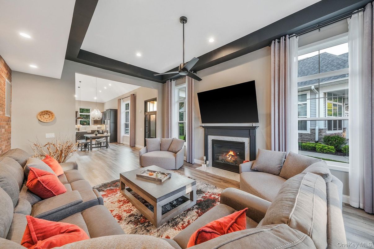 Dining room, Fireplace, Interior, Living room, Pendant Lights, Recessed Lighting, Wood Texture Flooring