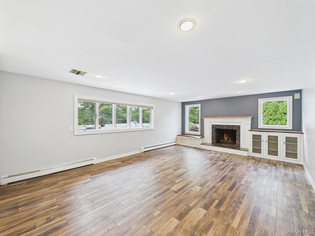 Empty room, Fireplace, Interior, Recessed Lighting, Wood Texture Flooring