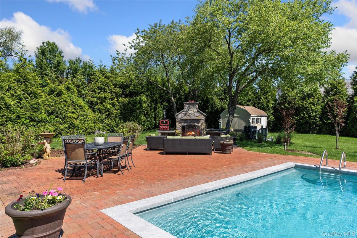 Exterior, Fireplace, Pool