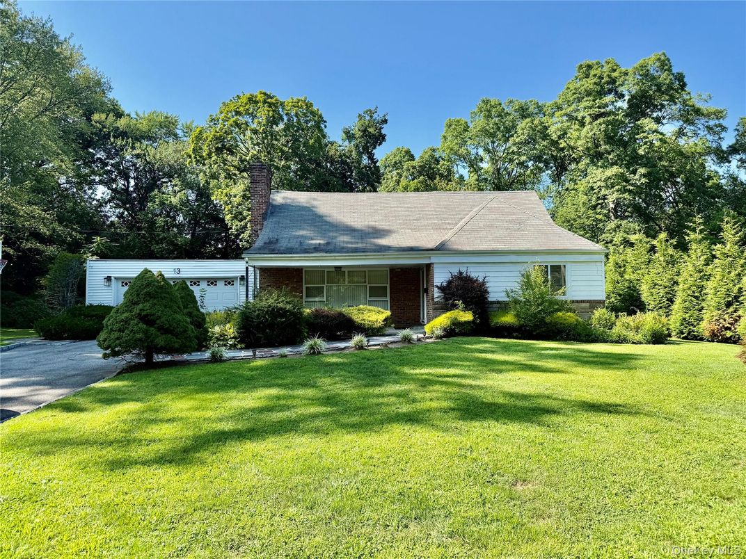 Attached, Backyard, Exterior, Facade, Brick Facade, Cape Cod