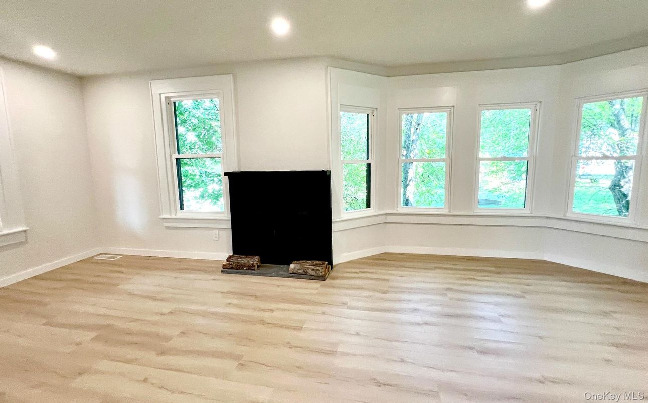 Empty room, Fireplace, Interior, Recessed Lighting, Wood Texture Flooring