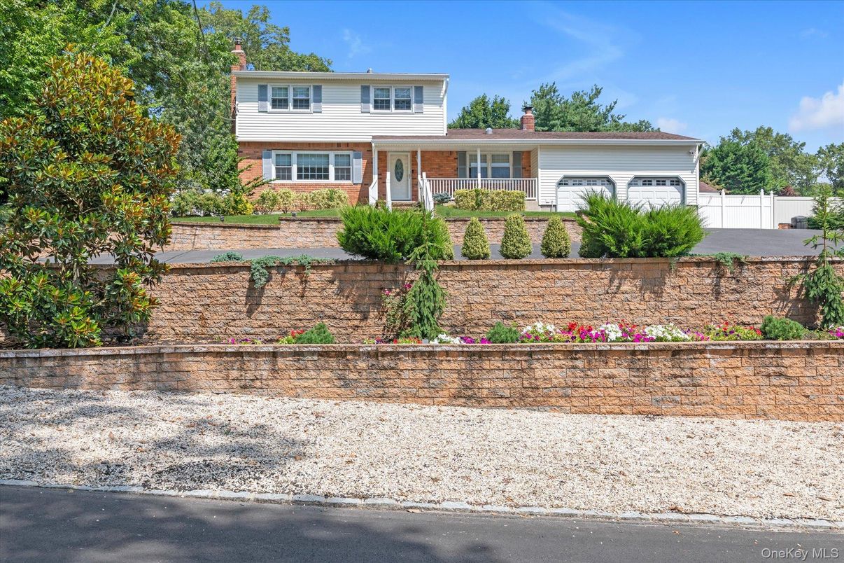 Attached, Exterior, Facade, Brick Facade, Split Level