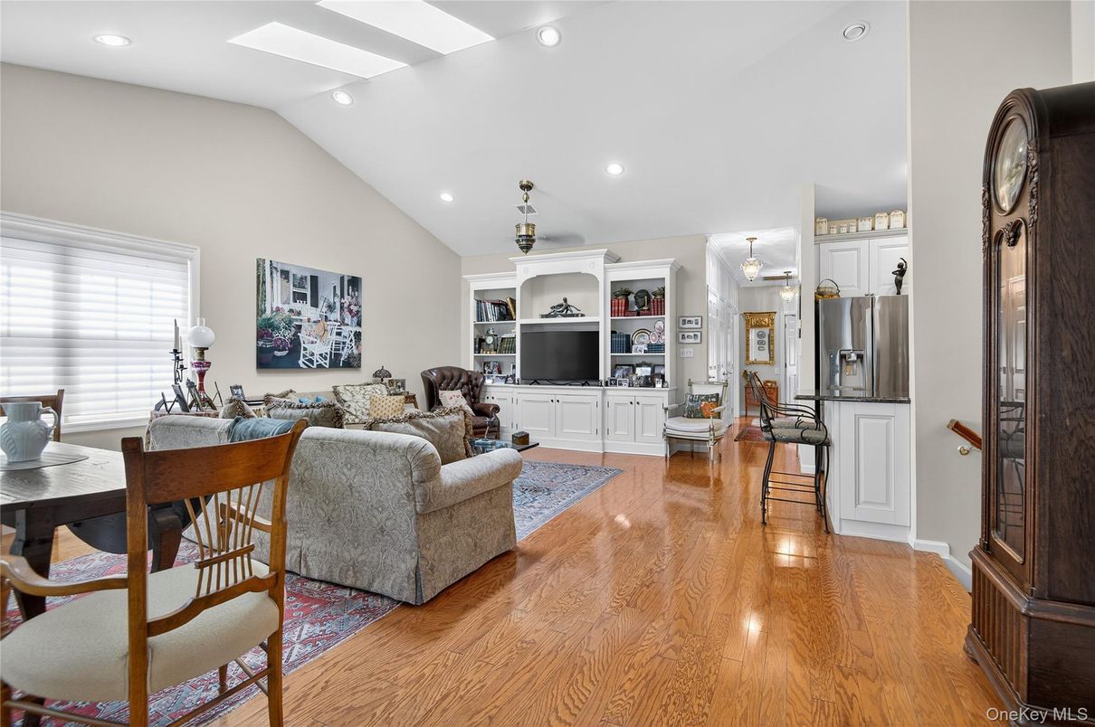 Dining room, Interior, Kitchen, Living room, Recessed Lighting, Stainless Steel Appliances, Wood Texture Flooring