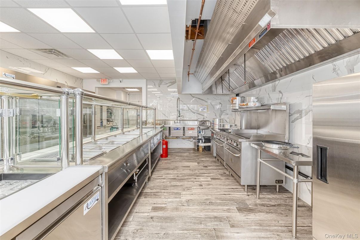Interior, Kitchen, Marble Walls, Stainless Steel Appliances, Wood Texture Flooring