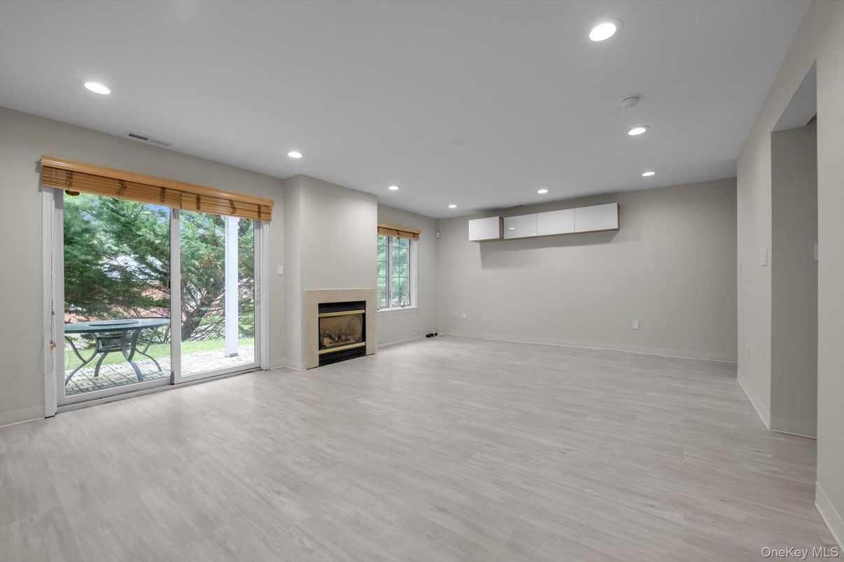 Empty room, Fireplace, Interior, Recessed Lighting, Wood Texture Flooring