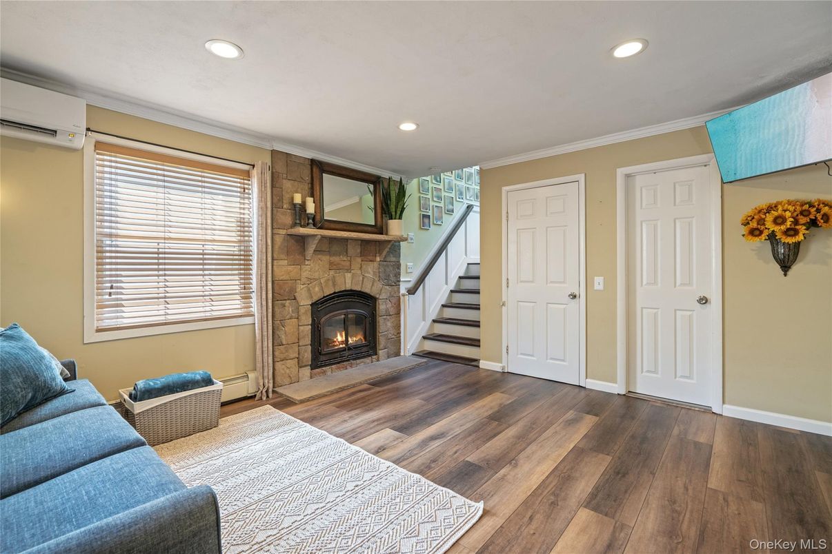 Fireplace, Interior, Recessed Lighting, Wood Texture Flooring