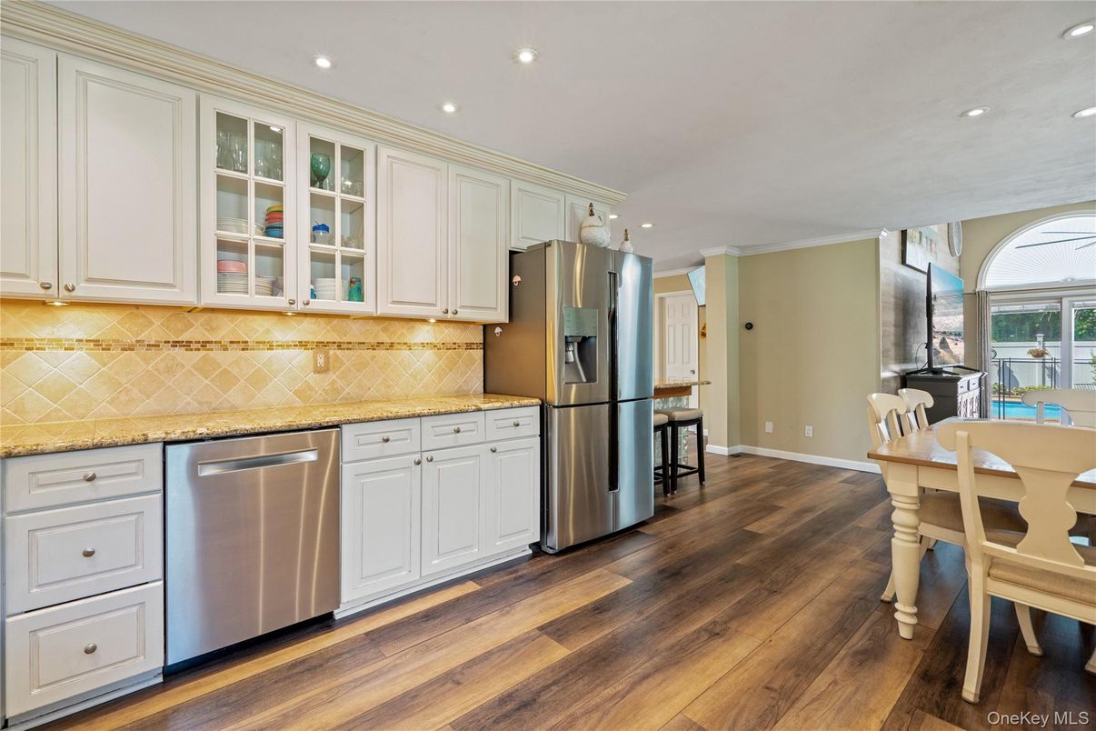 Dining room, Interior, Kitchen, Recessed Lighting, Stainless Steel Appliances, Wood Texture Flooring