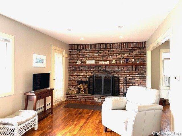 Fireplace, Interior, Recessed Lighting, Stone Walls, Wood Texture Flooring