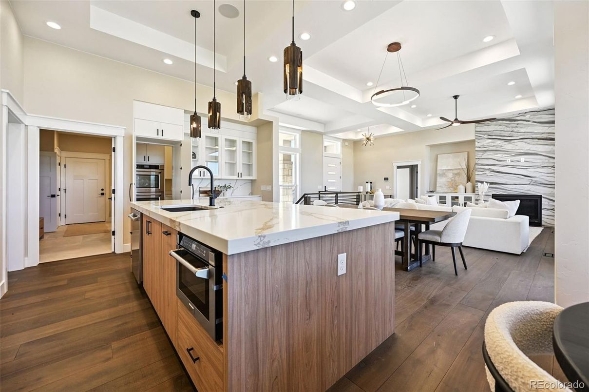 Dining room, Interior, Kitchen, Living room, Pendant Lights, Recessed Lighting, Stainless Steel Appliances, Wood Texture Flooring