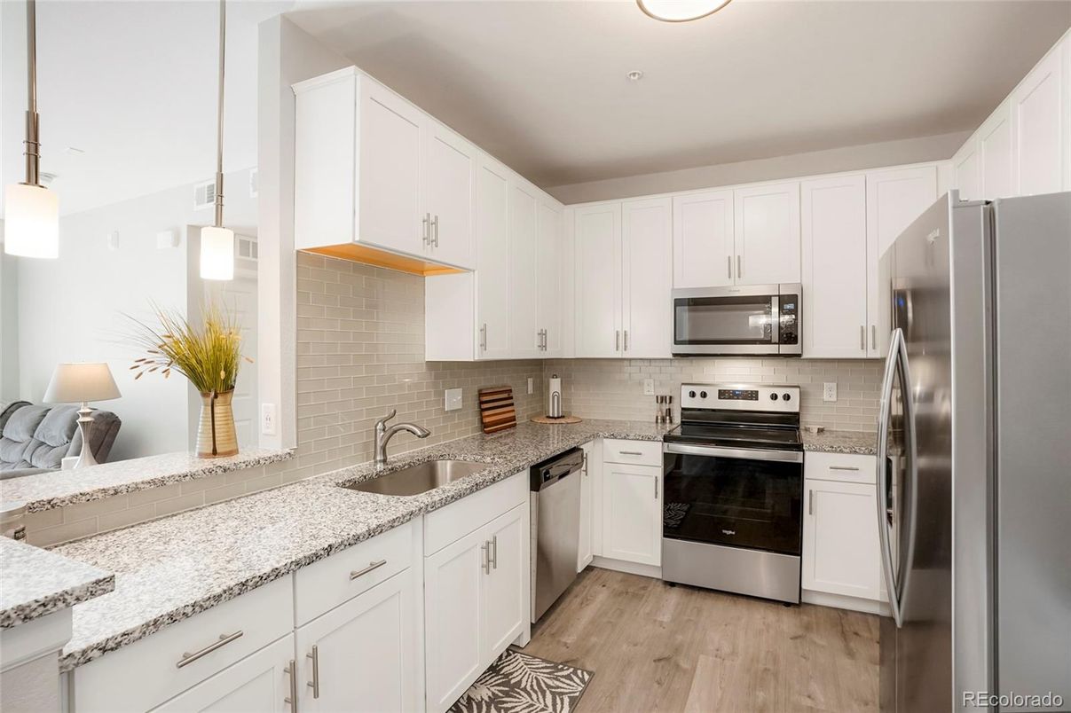 Interior, Kitchen, Pendant Lights, Recessed Lighting, Stainless Steel Appliances, Wood Texture Flooring