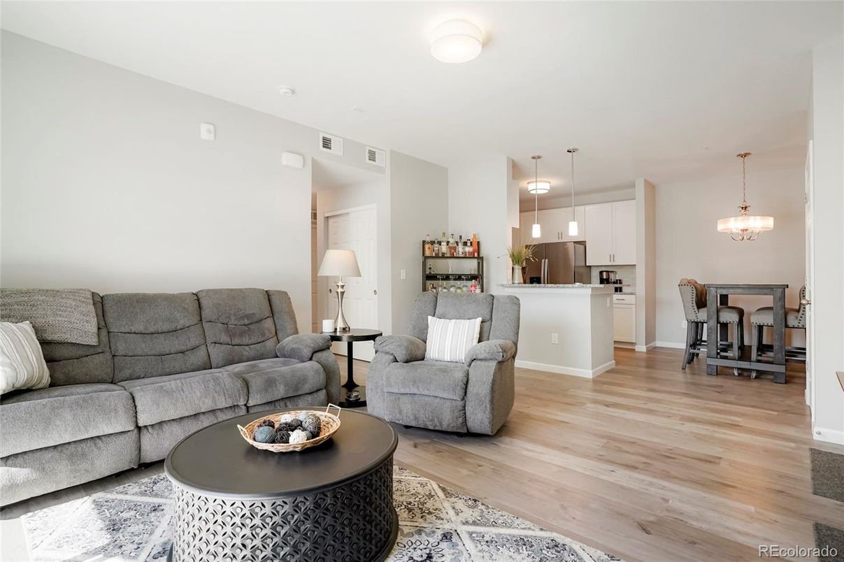 Dining room, Interior, Kitchen, Living room, Pendant Lights, Stainless Steel Appliances, Wood Texture Flooring