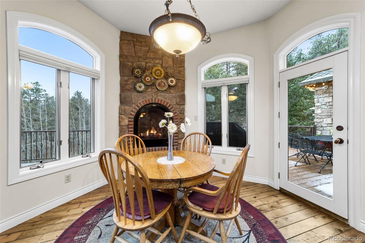 Dining room, Fireplace, Interior, Stone Walls, Wood Texture Flooring