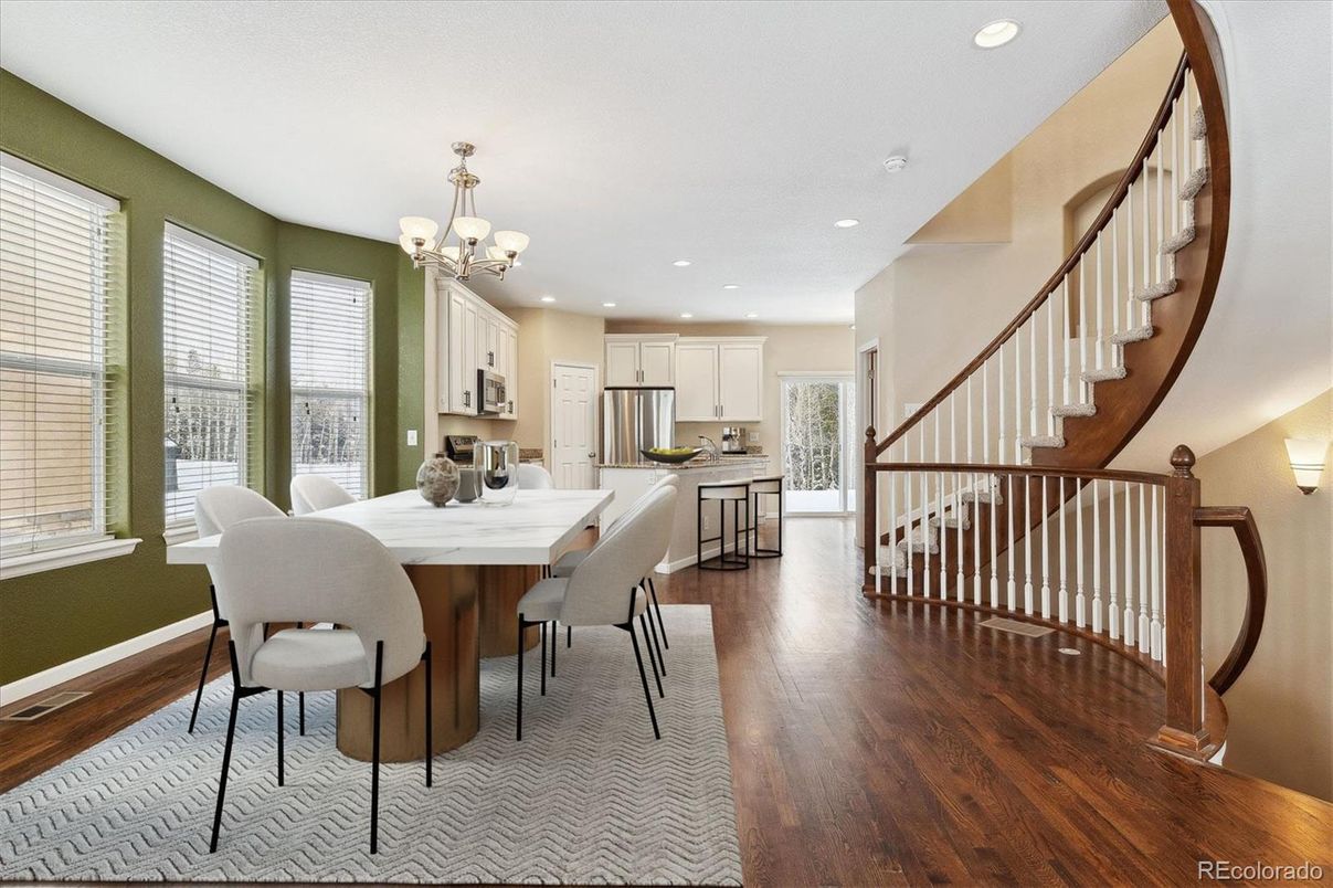 Chandelier, Dining room, Interior, Kitchen, Recessed Lighting, Stainless Steel Appliances, Wood Texture Flooring