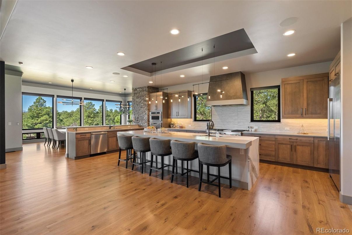 Dining room, Interior, Kitchen, Pendant Lights, Recessed Lighting, Stainless Steel Appliances, Wood Texture Flooring