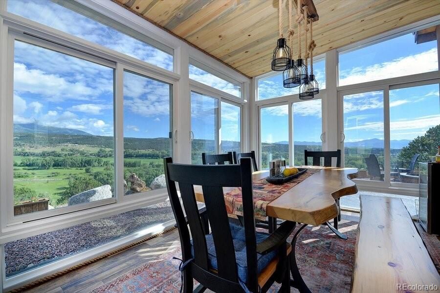Dining room, Interior, Pendant Lights, Sun Room, Wooden Ceilings, Wood Texture Flooring