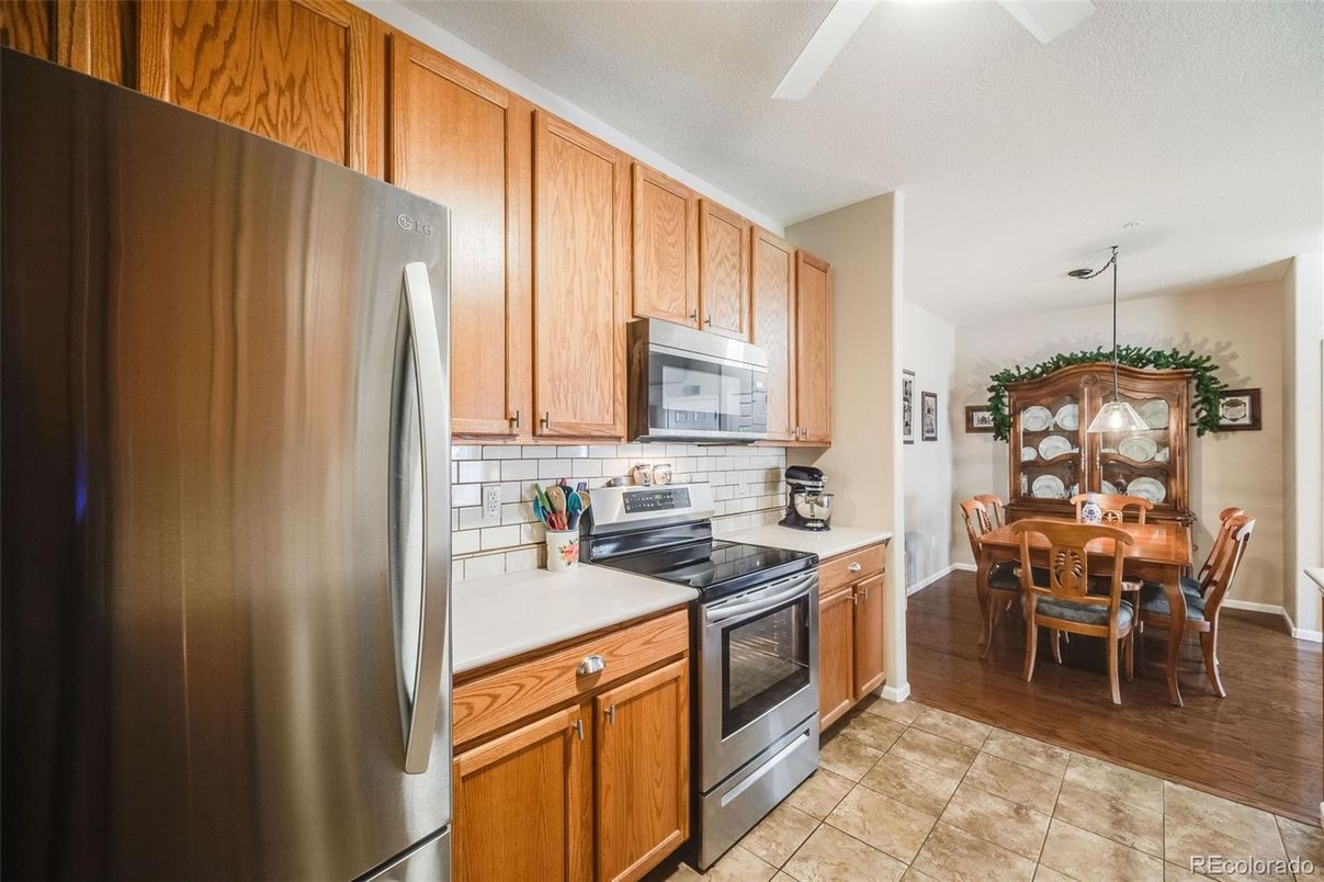 Dining room, Interior, Kitchen, Pendant Lights, Stainless Steel Appliances, Wood Texture Flooring