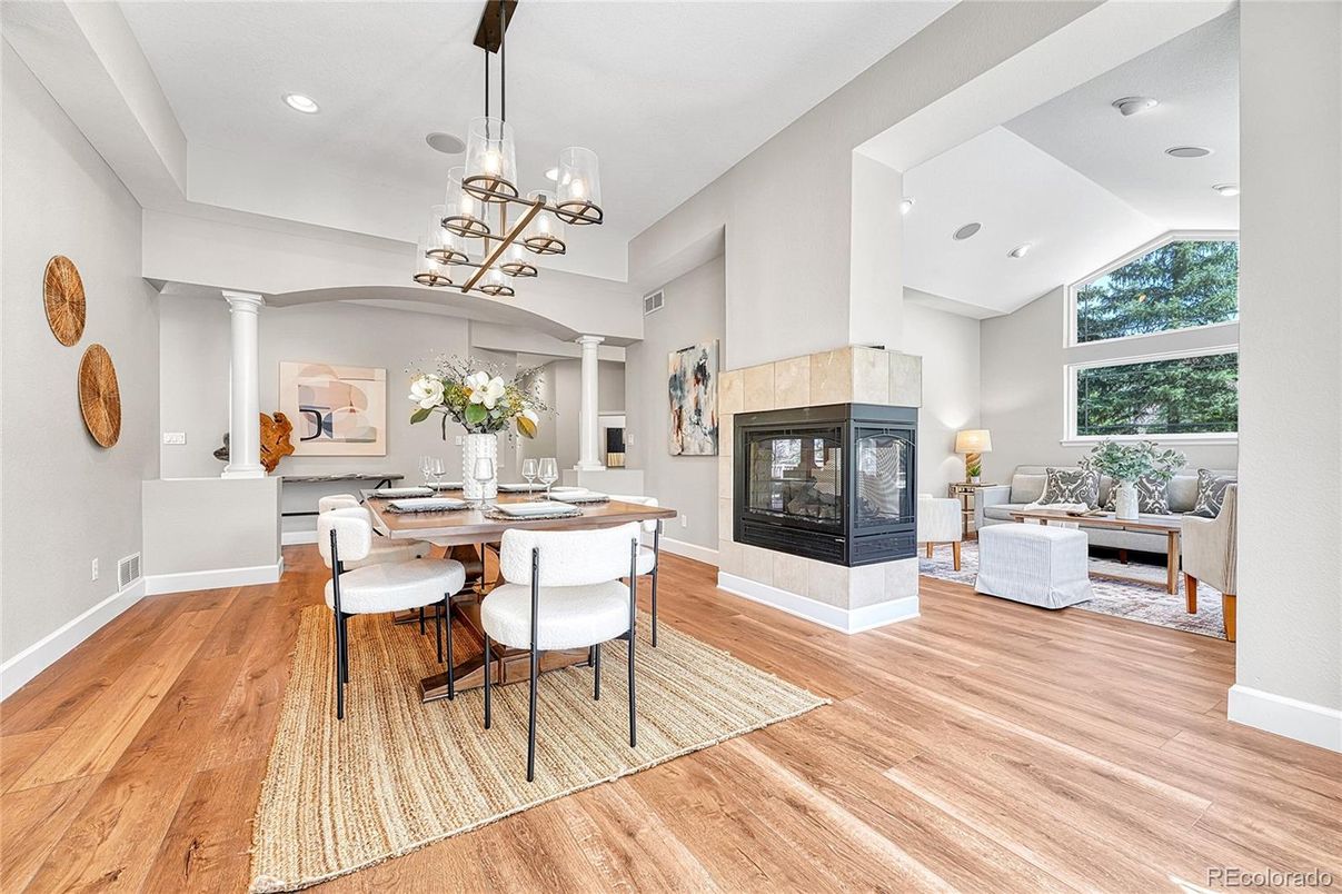 Dining room, Fireplace, Interior, Living room, Pendant Lights, Recessed Lighting, Wood Texture Flooring