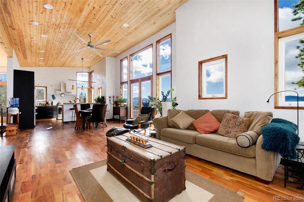 Dining room, Interior, Living room, Pendant Lights, Recessed Lighting, Wooden Ceilings, Wood Texture Flooring