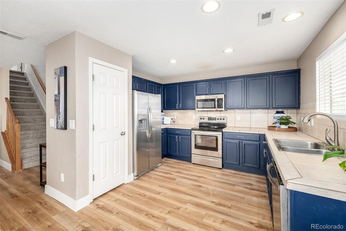 Interior, Kitchen, Recessed Lighting, Stainless Steel Appliances, Wood Texture Flooring