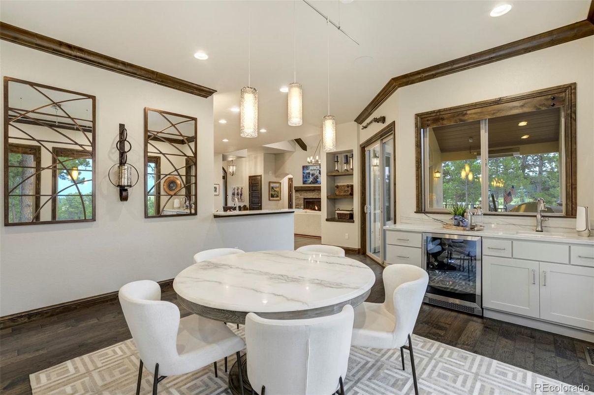 Dining room, Interior, Kitchen, Pendant Lights, Recessed Lighting, Stainless Steel Appliances, Wood Texture Flooring