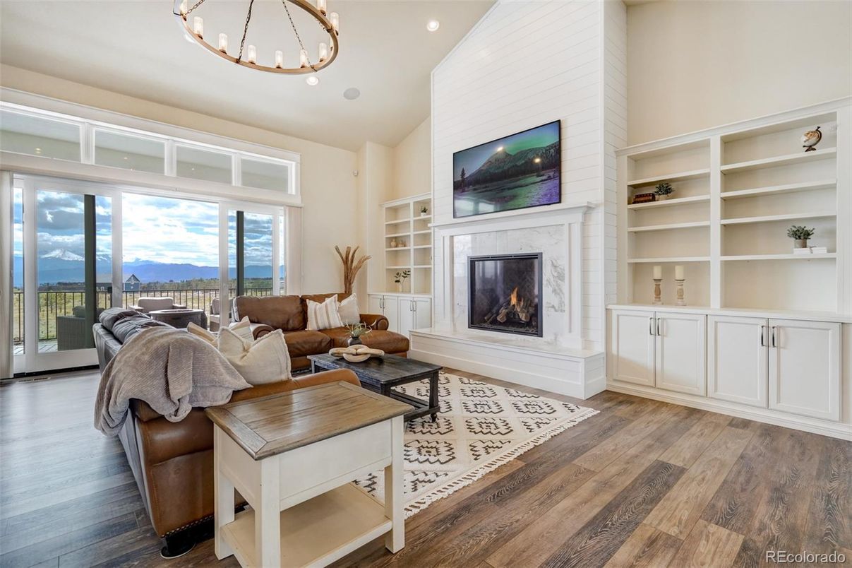 Fireplace, Interior, Living room, Recessed Lighting, Water, Wood Texture Flooring